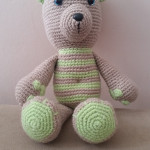Tummy teddy with green stripy body and green feet